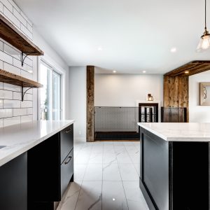 Typical budget Canadian single family house, renovated with some luxury elements in design partially furnished with kitchen, rooms, bedrooms, bathrooms, appliances, finished basement, fireplace, laundry, backyard and patio